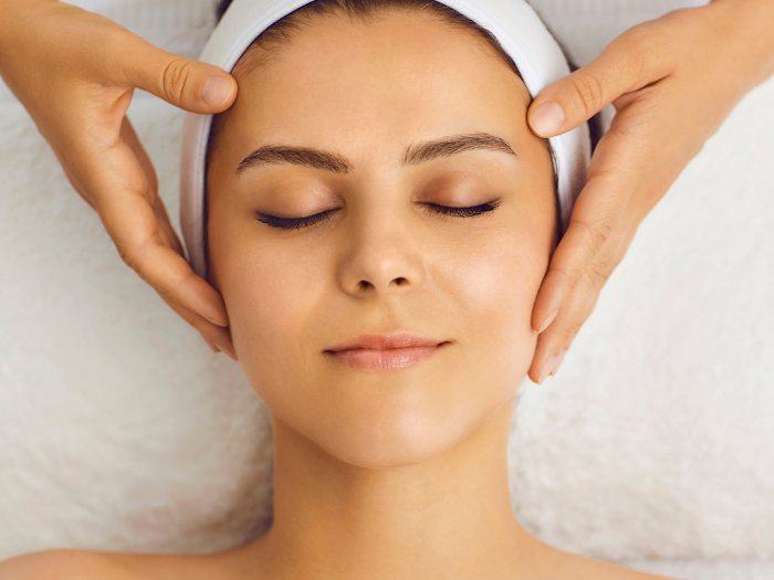 A client relaxing during a facial